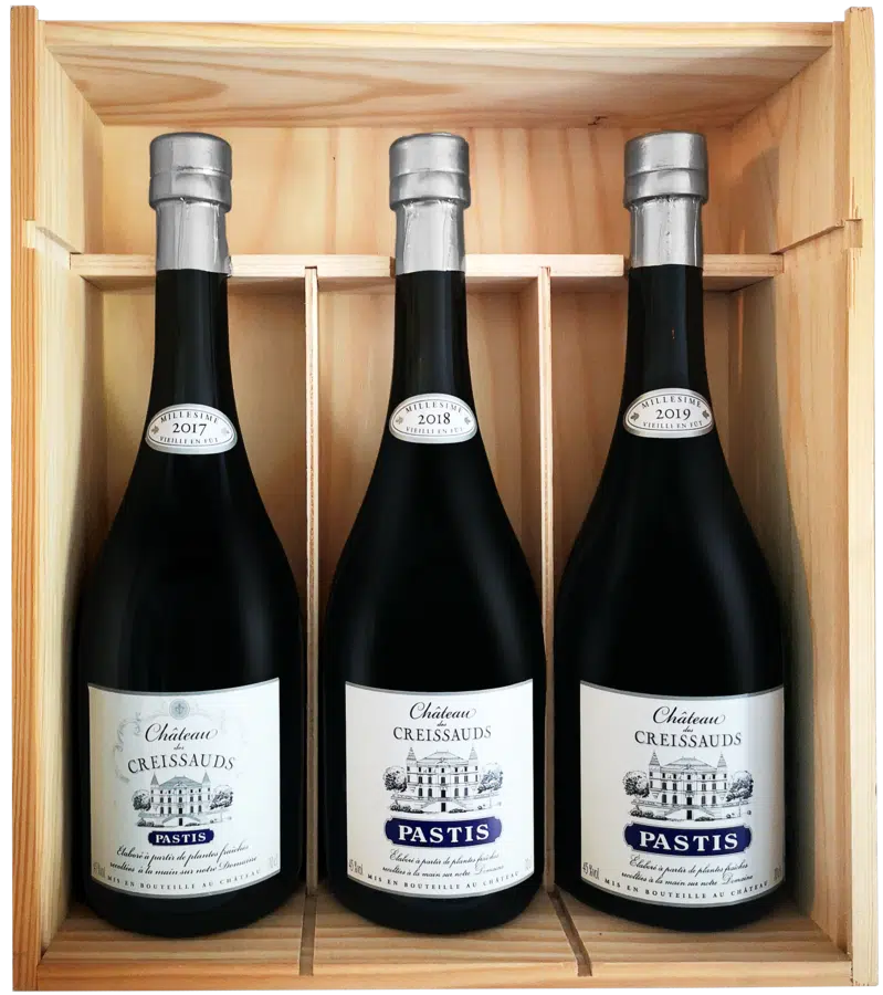 COFFRET BOIS PASTIS MILL. CHÂTEAU DES CREISSAUDS, 3×70 CL (MILL. 2020, 2019  & 2018)